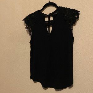 Sweet wanderer black top with lace sleeves and string tie on backside of collar